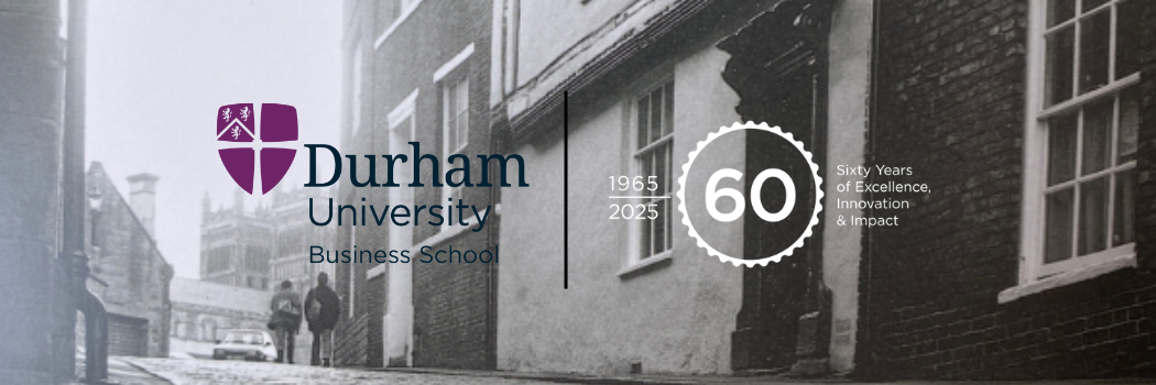 view from the bottom of Owengate street in the 1960s with the 60 anniversary business school logo