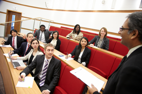 Group of students from 2010s era engaging in a lecture