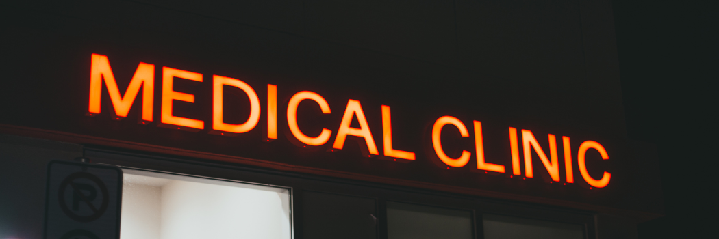 Signage of a medical clinic in the dark