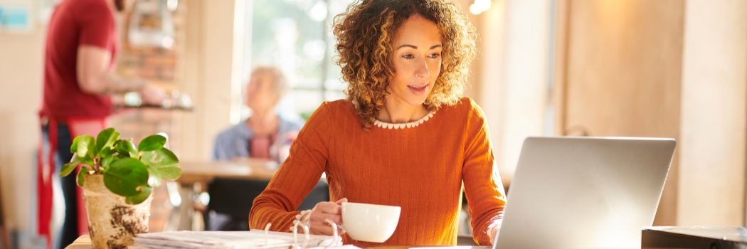 Business woman working from cafe