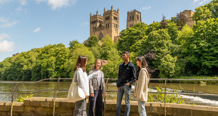 Students by the river talking