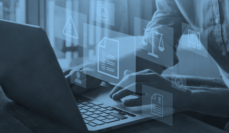 hands typing on laptop