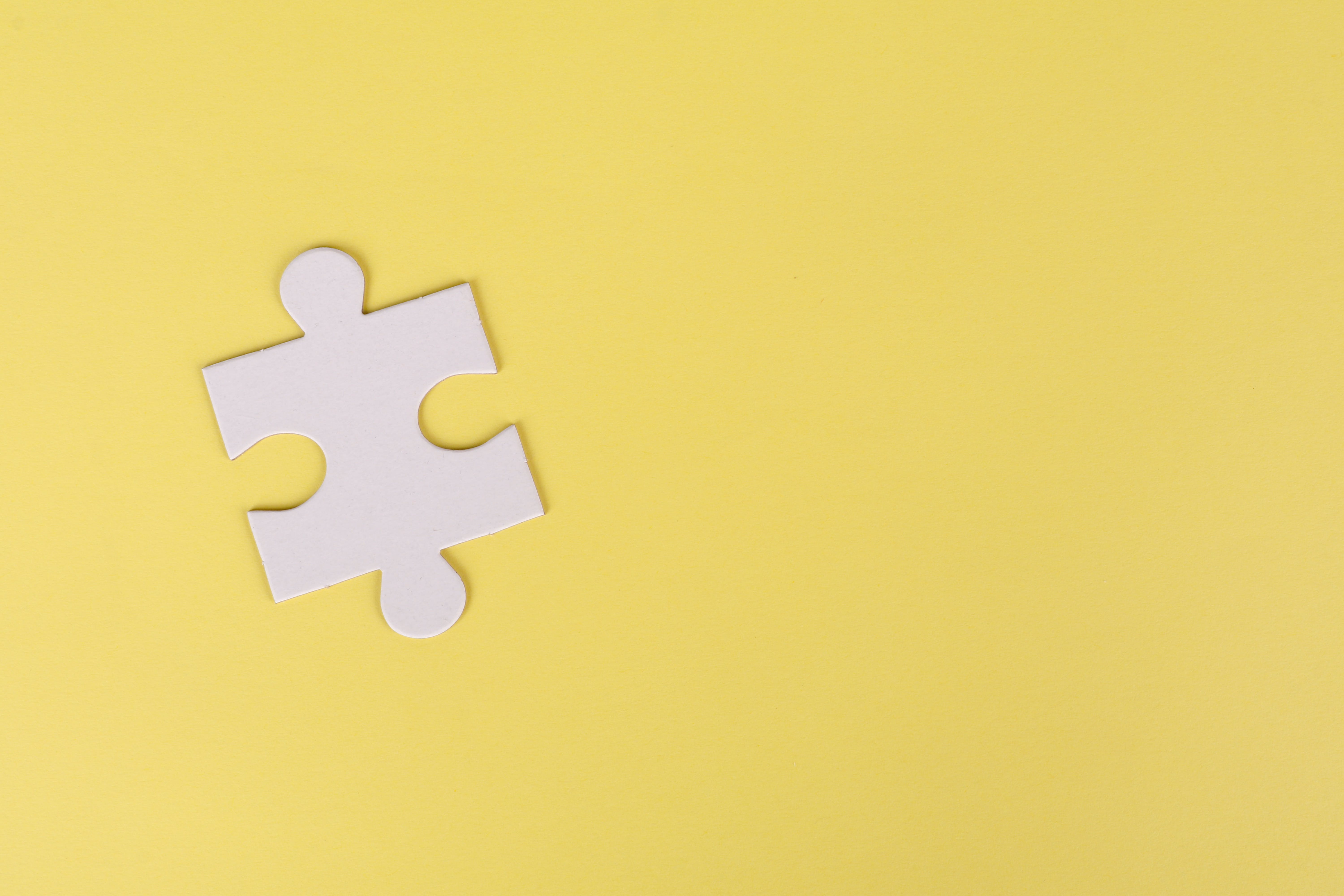 puzzle piece in yellow background