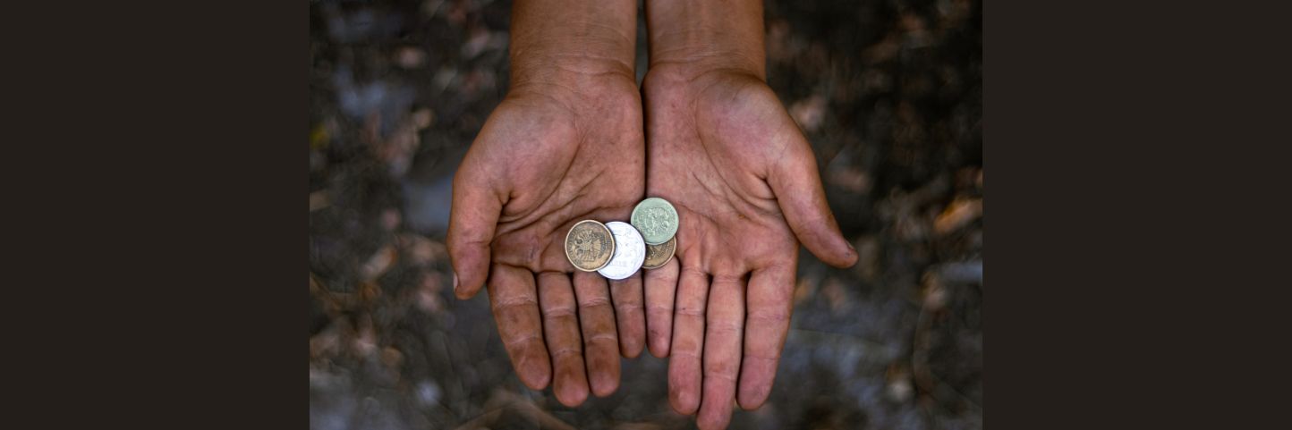 Dirty hands with small money in palms