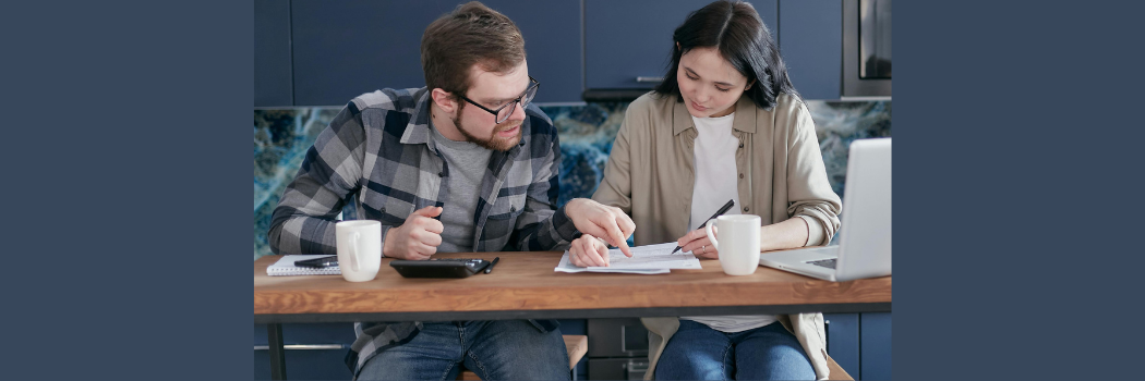A couple of students working out their debt