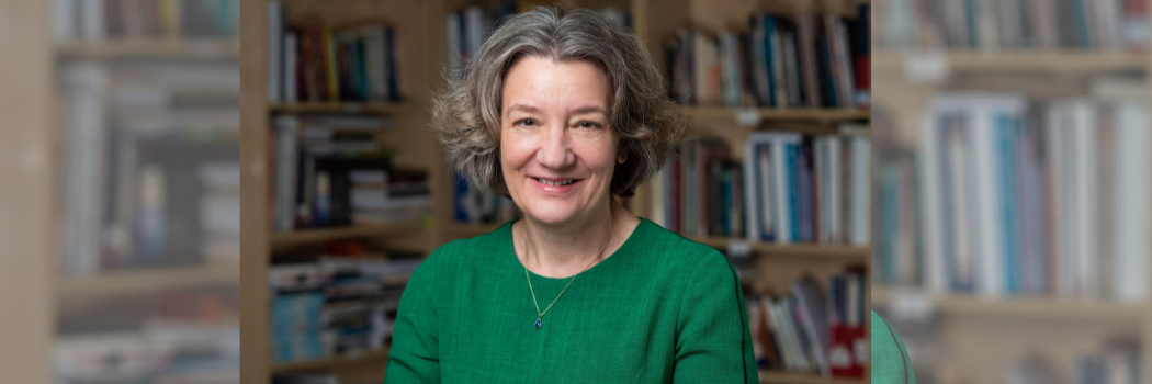 Vice Chancellor Karen O'Brien wearing a green top smiling at the camera