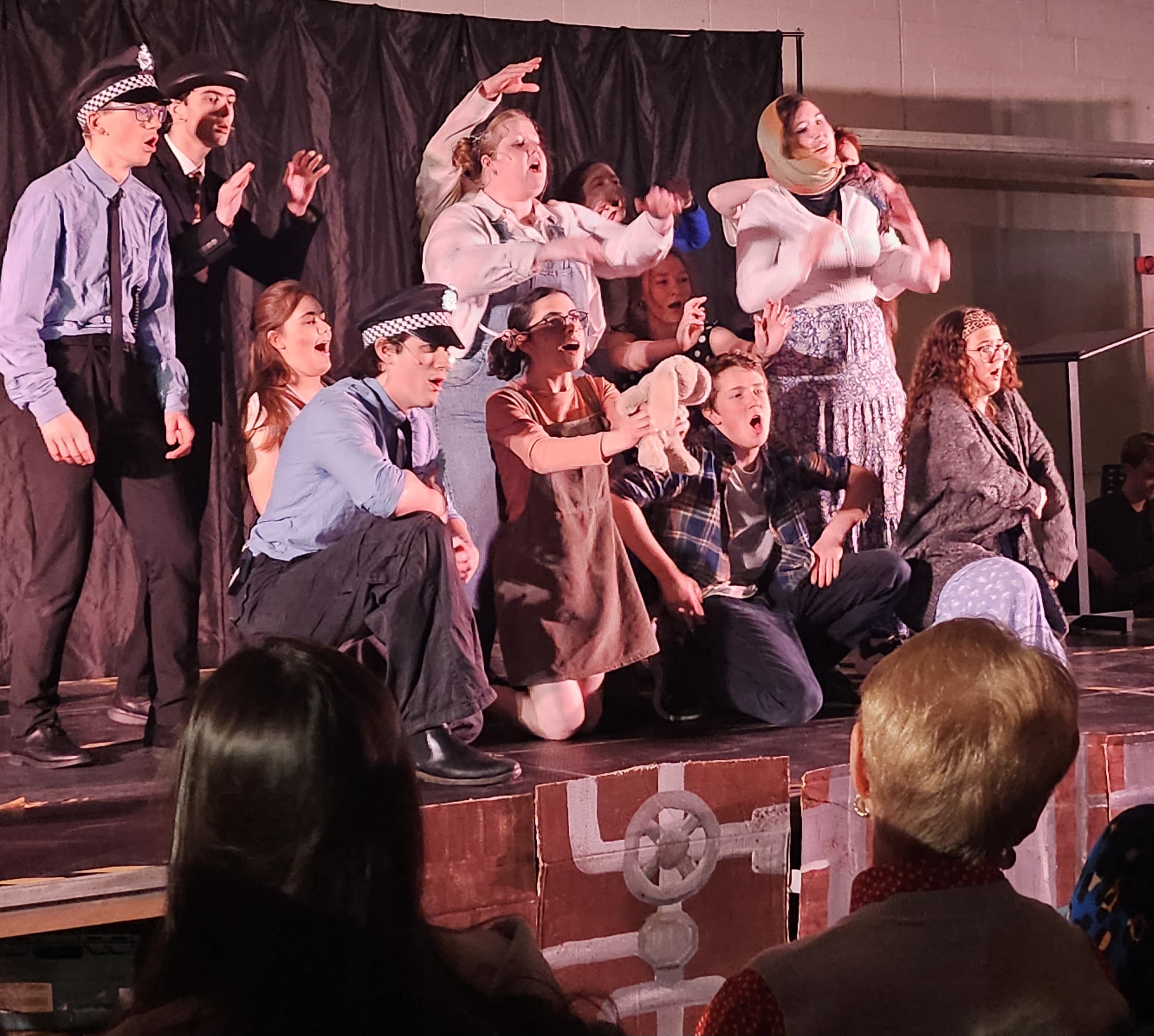 students on stage for a musical production