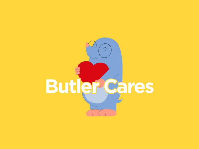 cartoon mole holding love heart with 'butler cares' written on