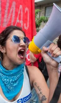 Female shouting into a loudhailer