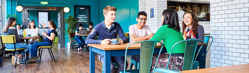 Students chatting in a café
