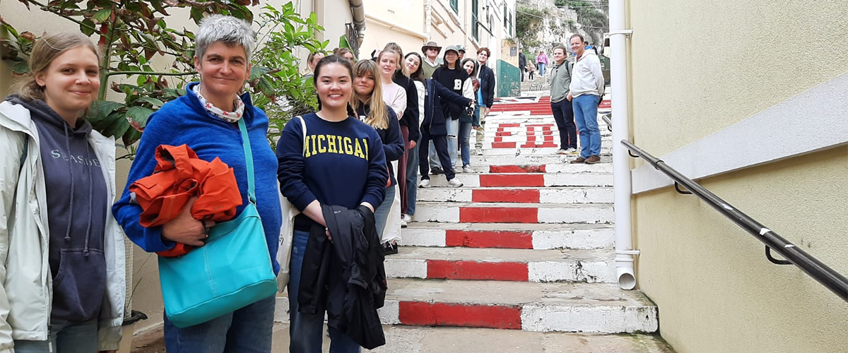 Gibraltar fieldtrip staff and students posing on some steps