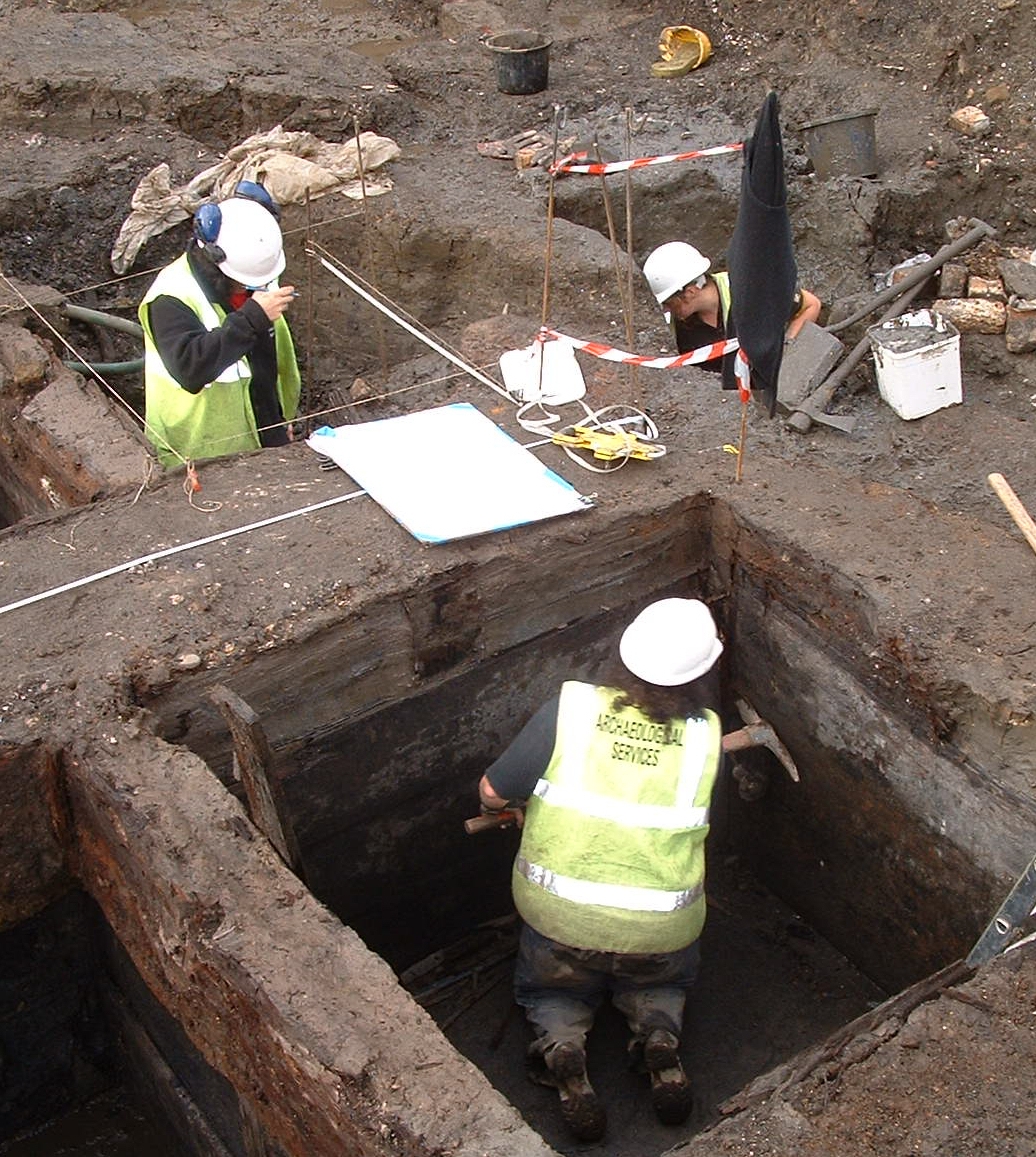 Students inside an excavation during an archaeology field trip