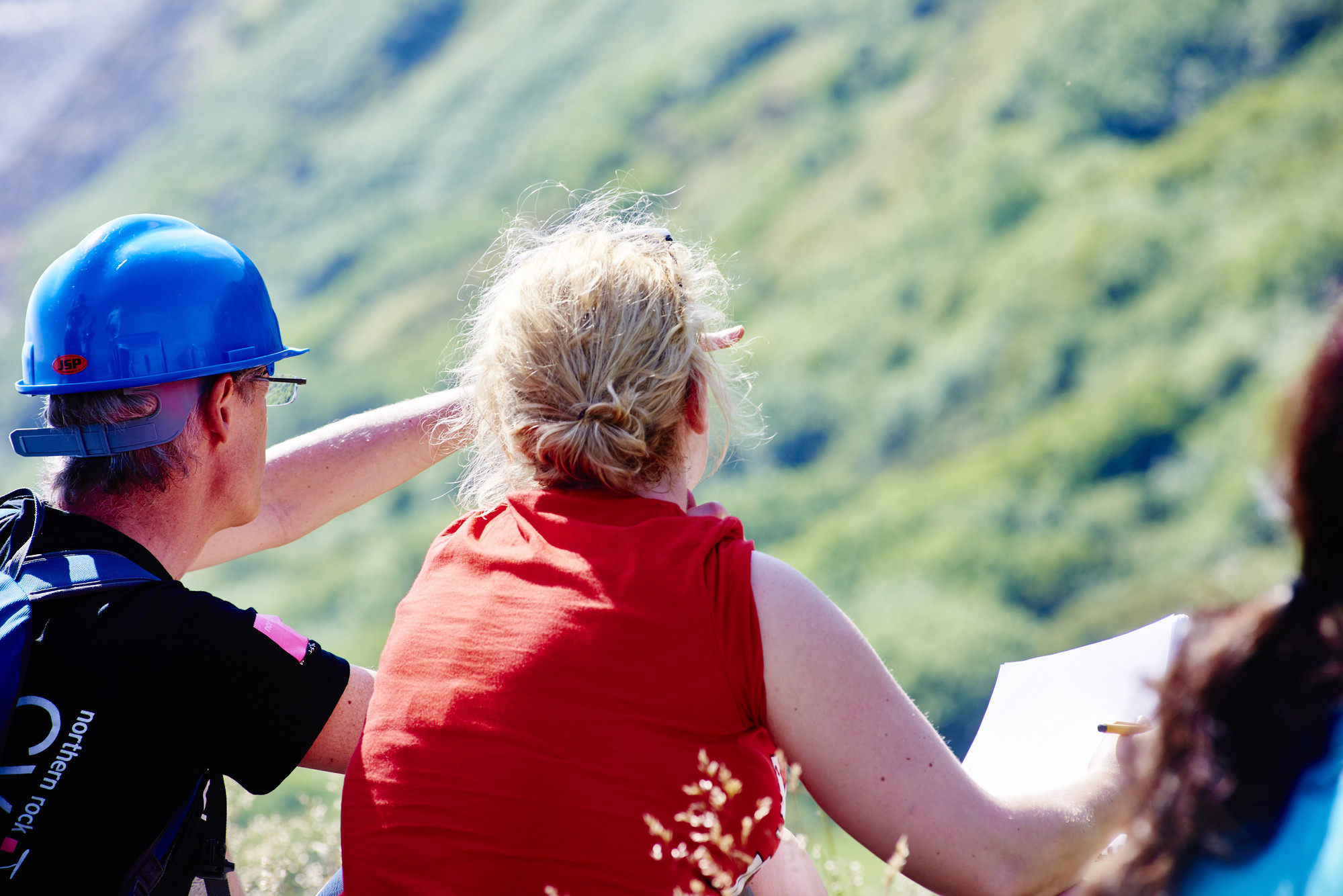 People looking over into the distance