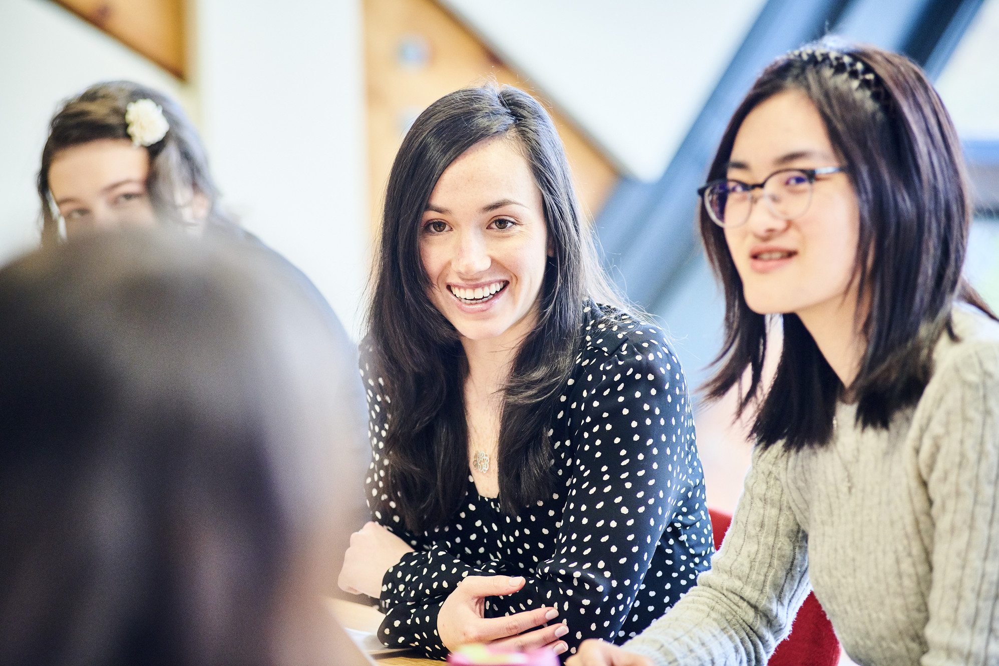 Photos of students in the Law School lecture theatre, moot court room and study areas.