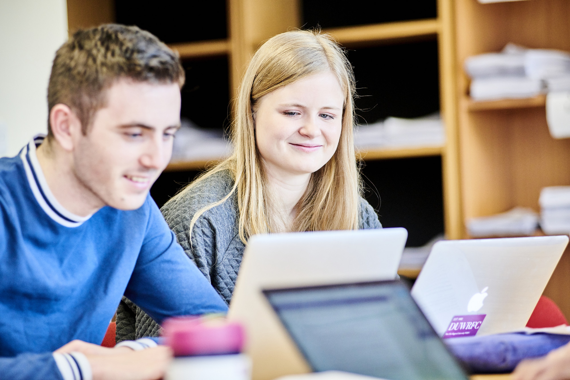 Two students studying in class