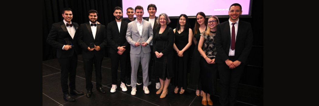 Blueprint Challenge finalists smiling to camera with the Vice-Chancellor