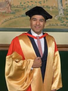 Nick Mohammed in congregation robes