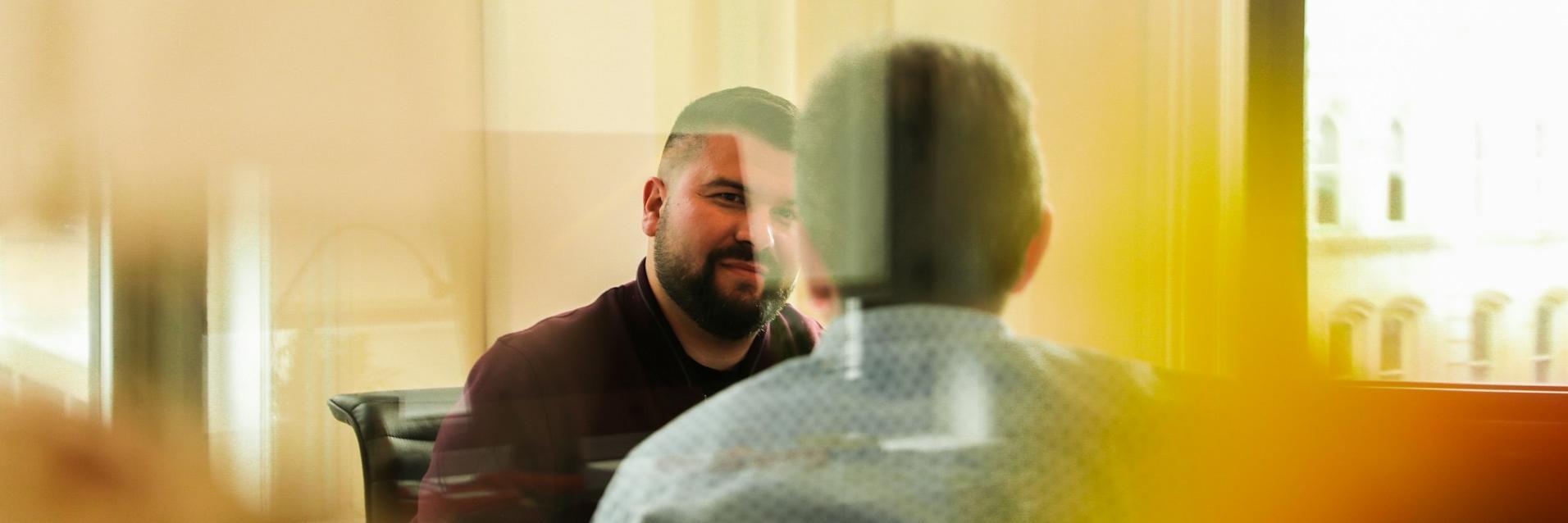 Two people talking to each other