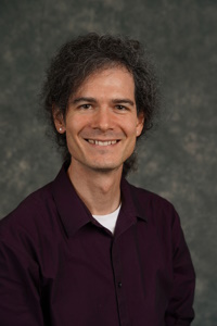 headshot of Dr Cameron Cross IAS Fellow 2025/26