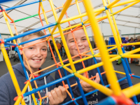 Two boys building with K'NEX