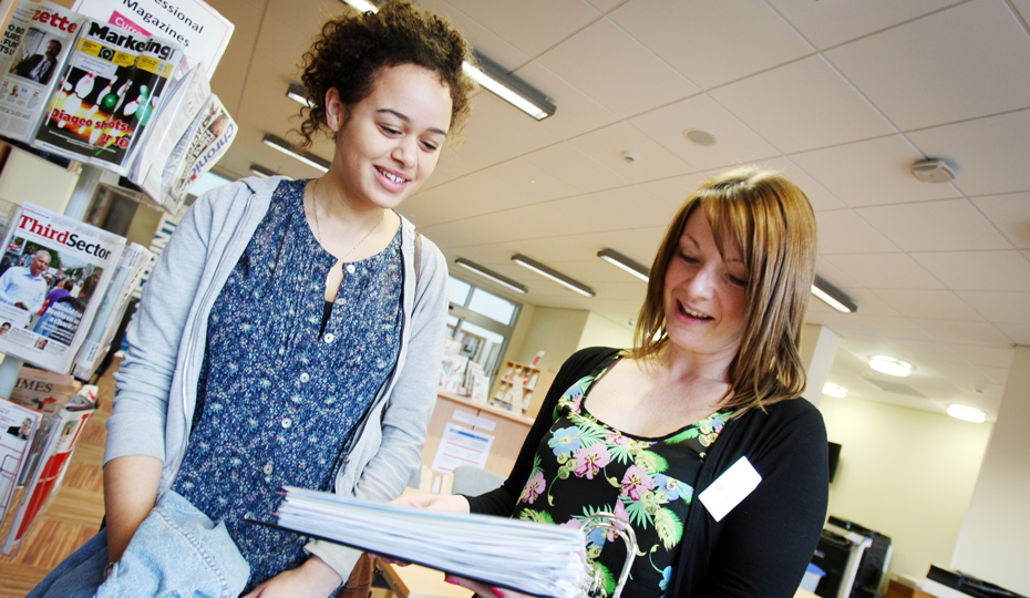 A member of the Careers and Enterprise Centre discusses the available career paths and options with a student