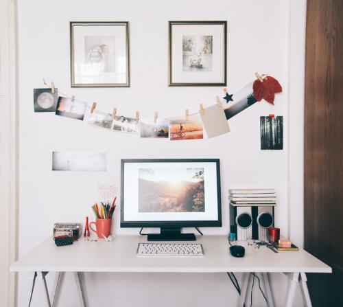 Computer desk with photos and personal items