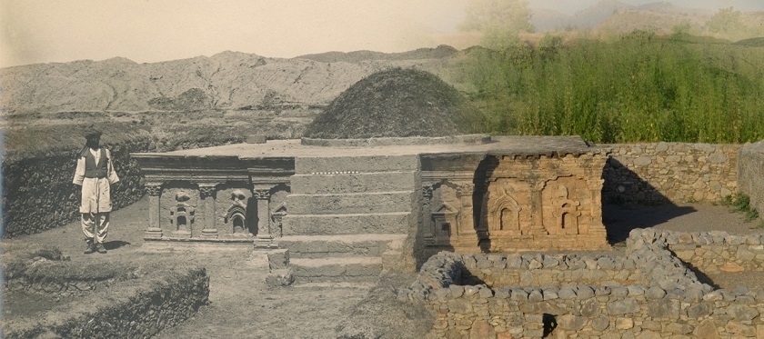 Half of the image is in black and white, showing the site in the early 20th century. The other half is a colour 21st century image.